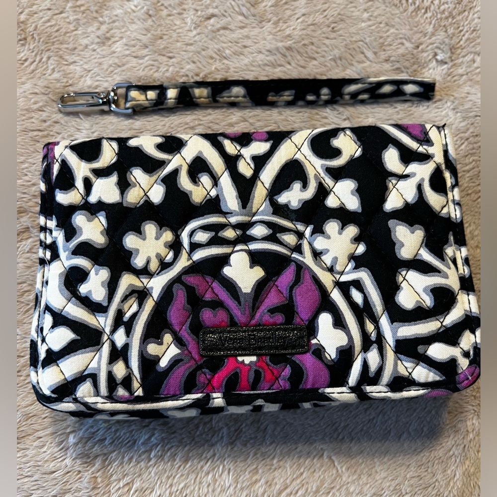Vera Bradley crossbody and/or wristlet.